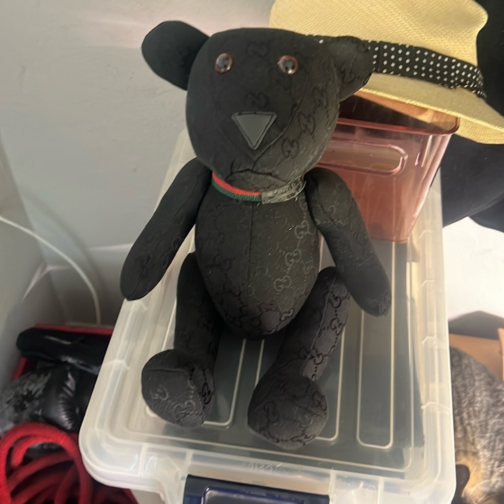 Authentic Gucci monogram teddy bear in black.